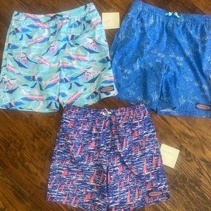 Three pairs of Vineyard Vines boys swimsuits. Two youth large & 1 youth medium.